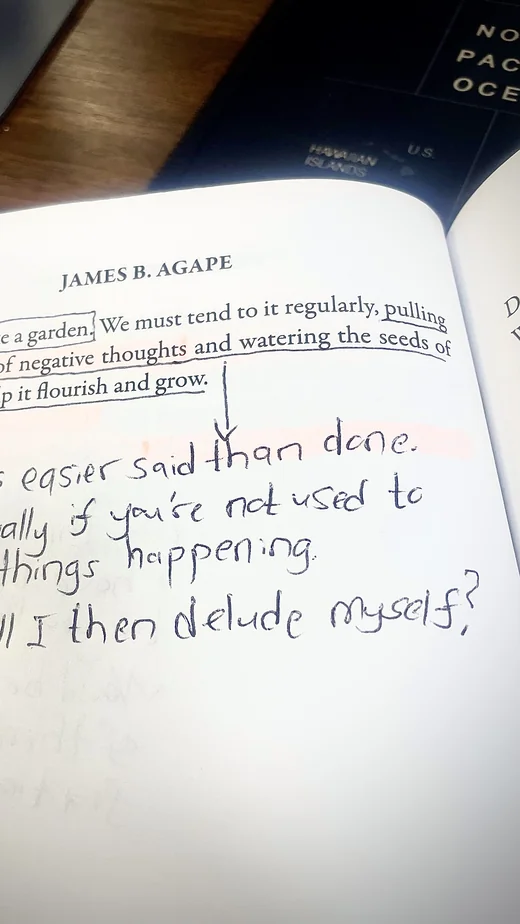 Reader's handwritten reflection on a page from Pent Up Thoughts by James B. Agape